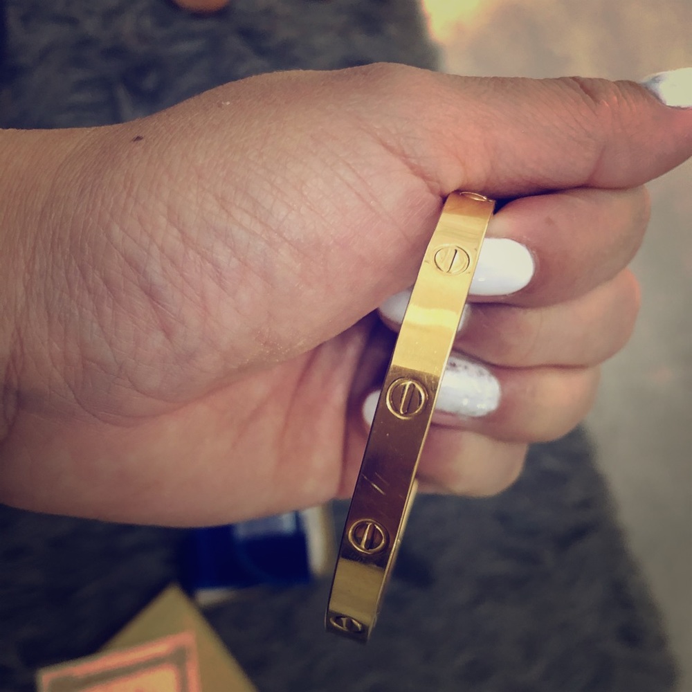 Charles Revson Ultima ll X Cartier Love Bracelet